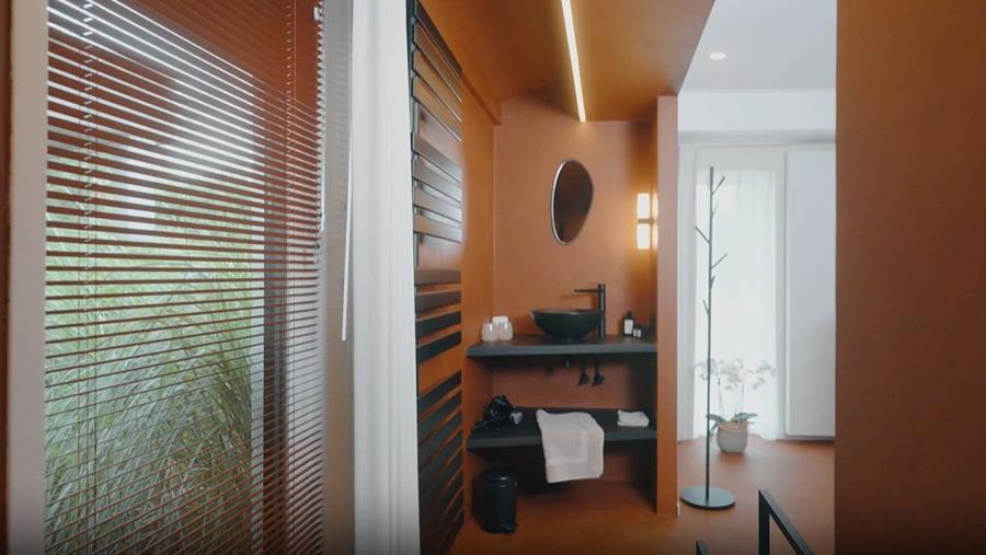 Un aspect luxueux pour les chambres d'hôtes grâce à un choix judicieux de couleurs et de matériaux